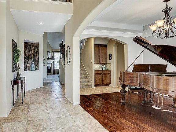 Archways throughout the home boasts character.