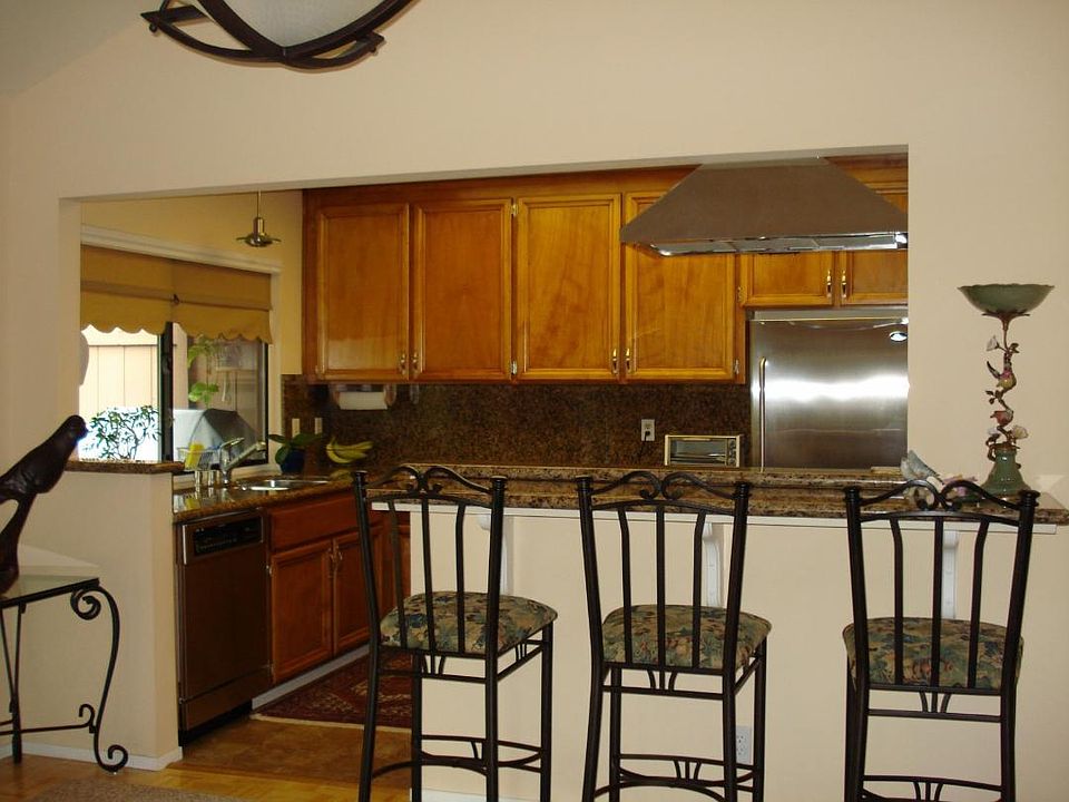 Photo of Kitchen and Bar Stool Sitting Area