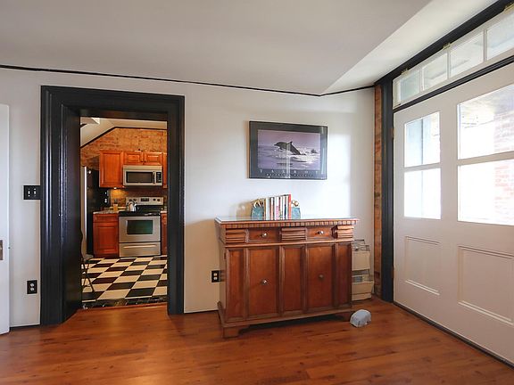 Closeup of Den with Kitchen & Deck Entries