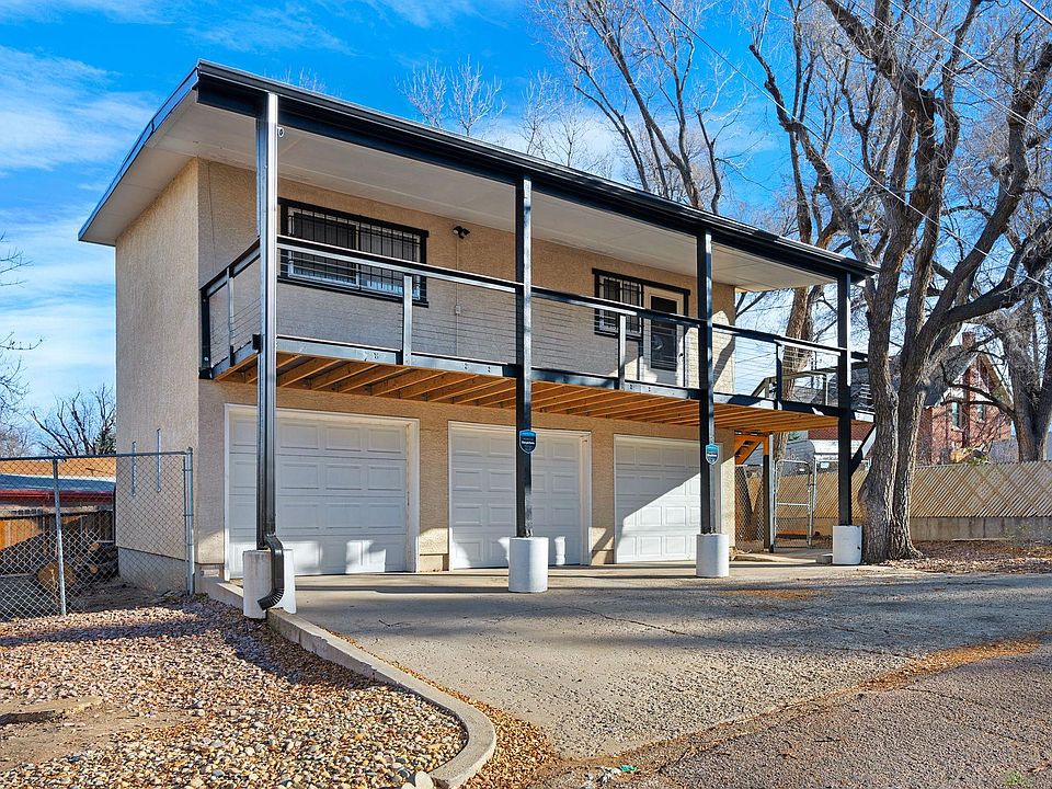 Handsome, free-standing single family home with three car garage off a quiet alley.