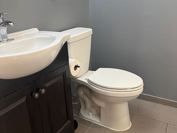 full bathroom with tub
