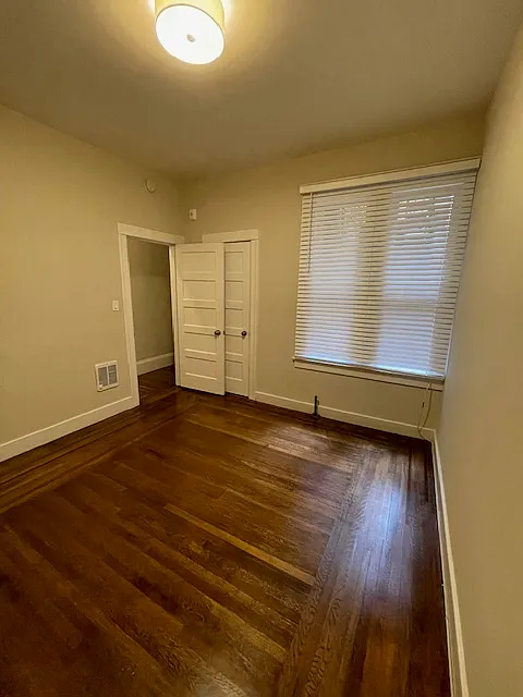BR facing doorway next to doorway is the closet