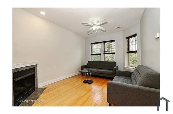 Building Photo - 2300 W Jarvis Ave #3