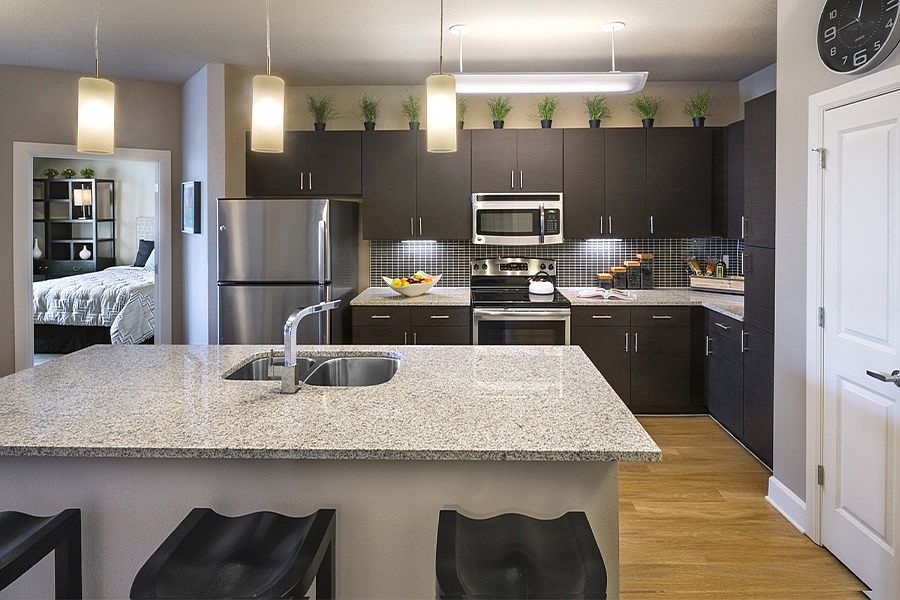 Contemporary kitchen layout is perfect for entertaining
