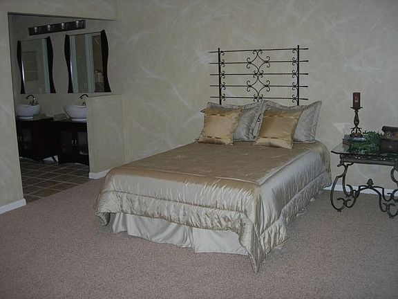 Master Suite - faux paint, Calif berber carpet, teak wood cabinets