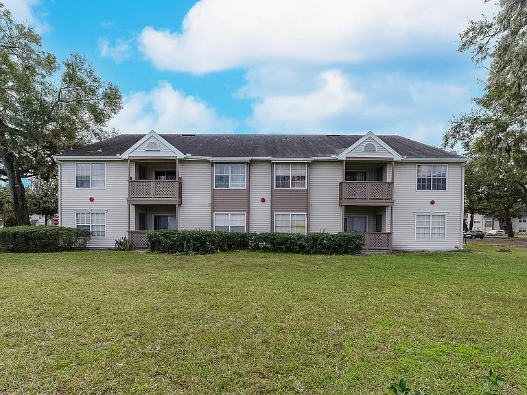 Experience tranquil living in this stylish apartment complex featuring spacious balconies and a serene environment.