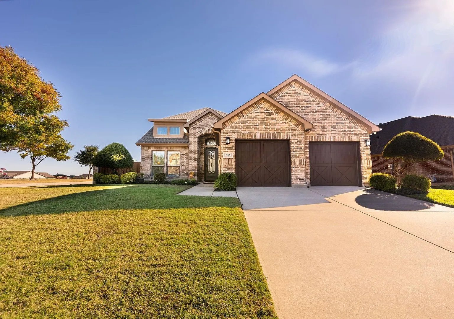 Custom Windsor Home on Corner Lot with Green Space Views — Photo 1