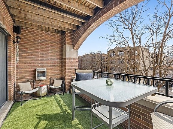 Huge, Recessed Balcony with wall-mounted gas heat for those chilly Fall evenings