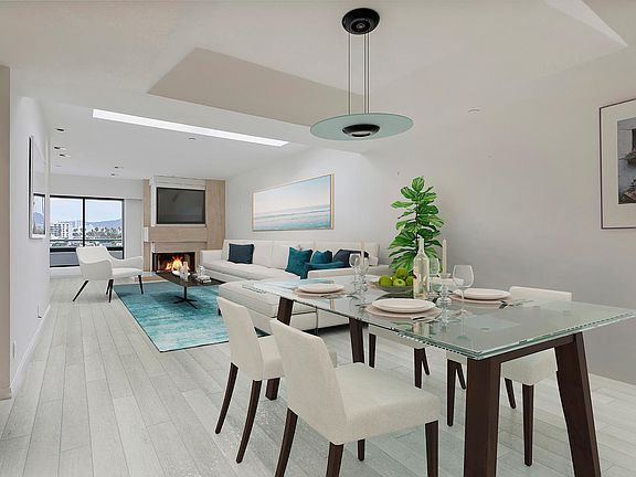 Large skylights with wonderful natural light streaming in Photo is virtually staged