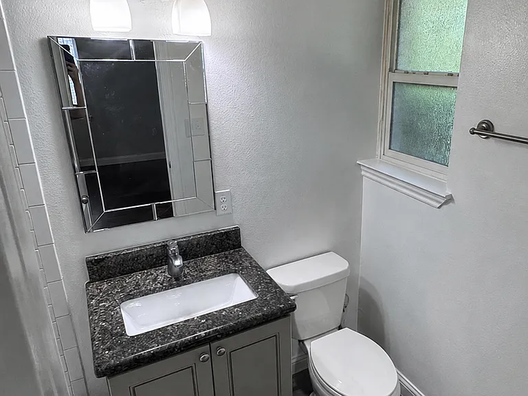 Photo from a previous listing. Tenant is currently occupying the Home.