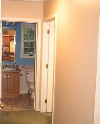Hall to 2 bedrooms