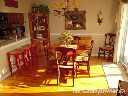 Dining room
						:
						Dining area with transition window to the kitchen, w sliders to deck.