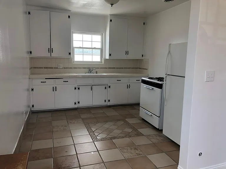 Eat-in Kitchen. Stove and Fridge included.