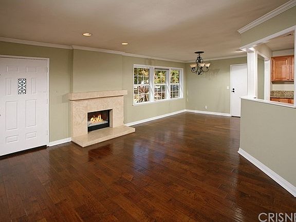 The formal dining room with drop down chandelier,
