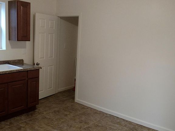 Kitchen with basement access.