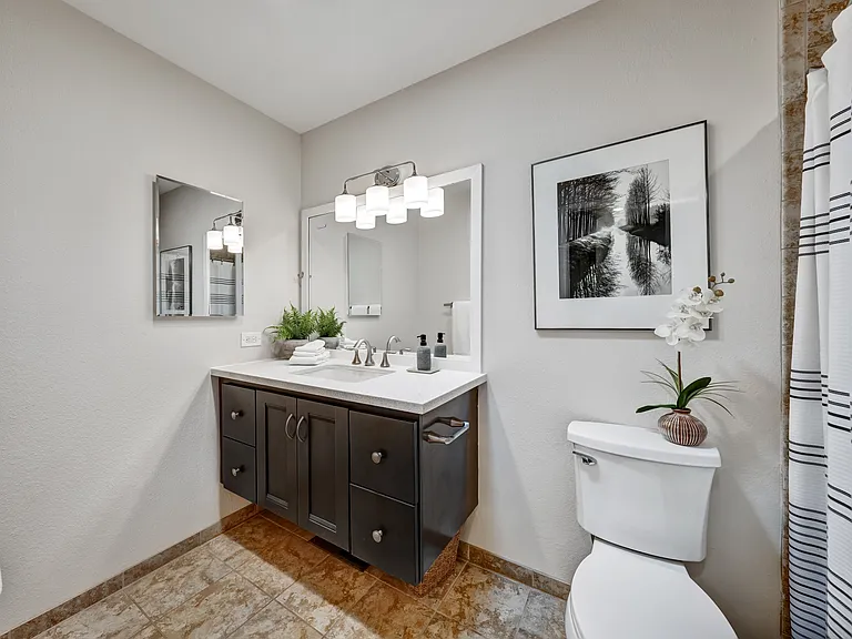 Hallway full-bathroom.