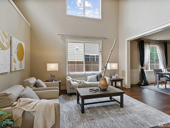 Elegant formal living connects to the formal dining area. Feauturing plenty of windows for natural light!