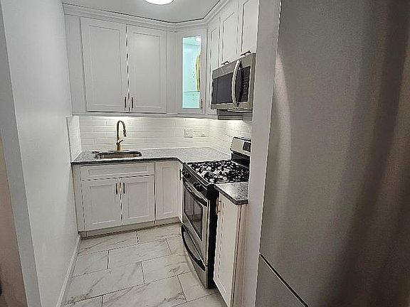 5th image of 140-17 84th Dr APT 3J