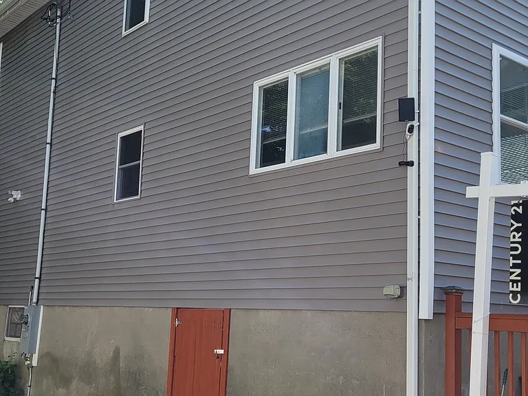 Side of exterior over large yard