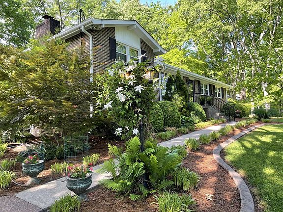 Beautiful walkway to front door of this split level home
