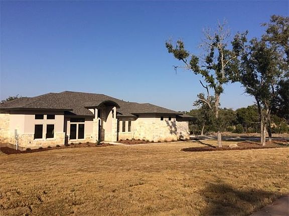 One acre home site with many trees- especially in the back yard!