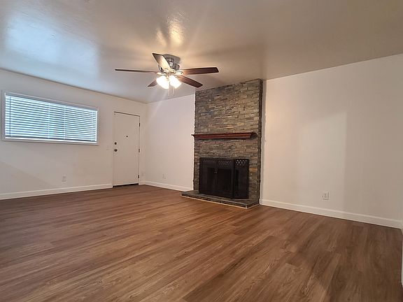 Flagstone gas fireplace in family room