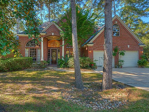 Double wide drive way leads to oversized 2 car garage.