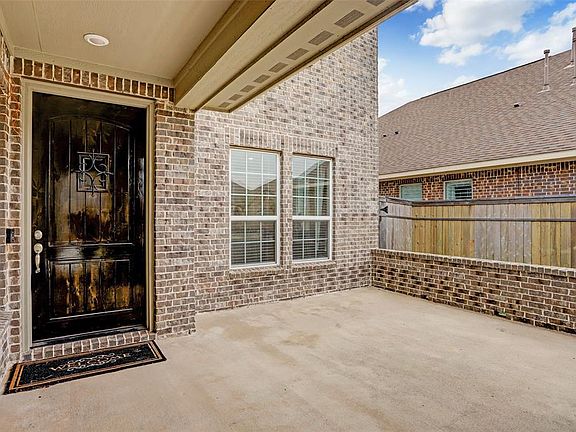 This unique courtyard entry is ready for your personal touches. What a fabulous opportunity to make a grand first impression.