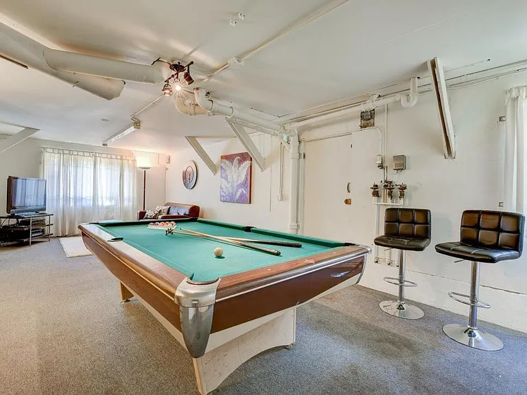 THIS IS NOT PART OF THE 2723 LIVING SPACE. 500 SQ FT. BASEMENT BEHIND THE GARAGE
