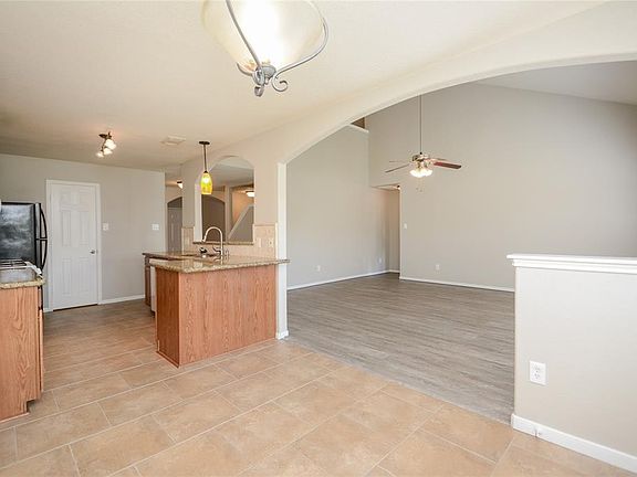 Breakfast Area to Kitchen and Living Area