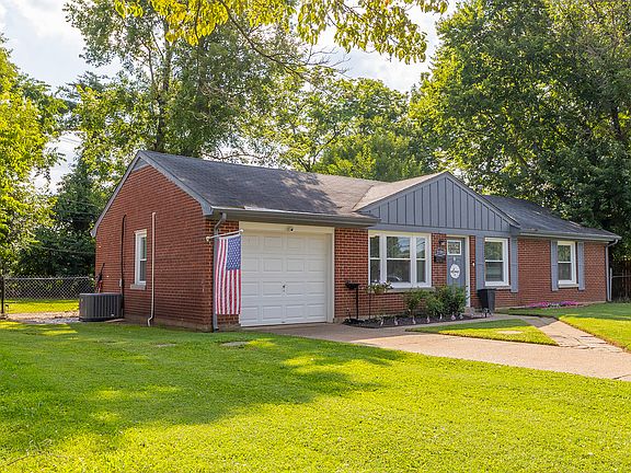 1 car garage has extra storage space and attic access.