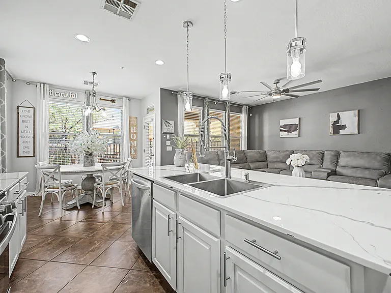 More view of the kitchen and eating area.