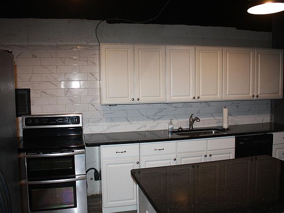 Our complete country kitchen features plenty of cabinet space, double oven range, refrigerator, dishwasher and everything you need to fix a great meal.