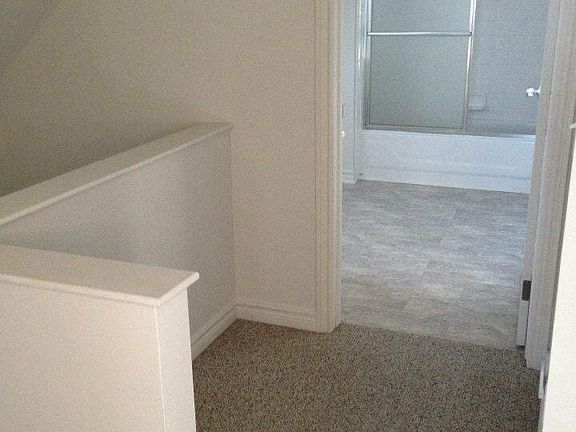 Upstairs hallway looking into upstair's bathroom