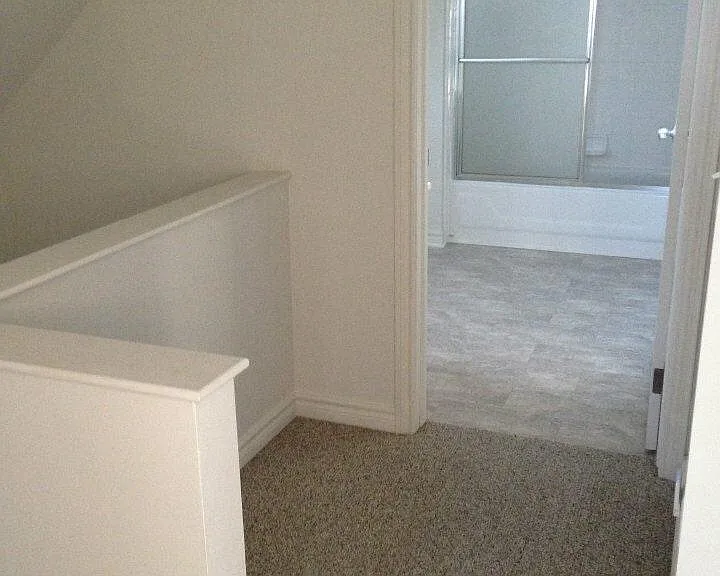 Upstairs hallway looking into upstair's bathroom