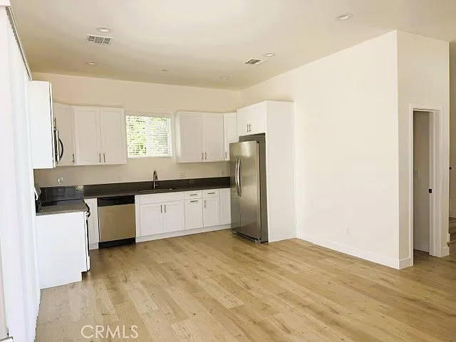 6849 1/2 De Celis Pl — Photo 1
