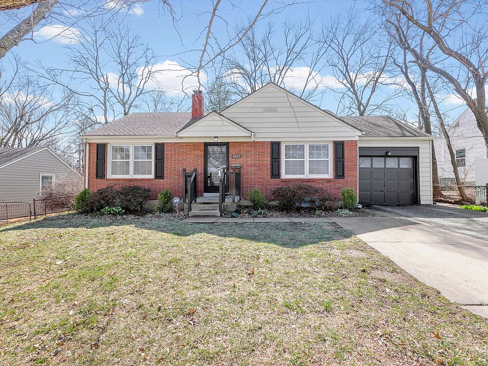 exterior - single story brick house with 1-car garage