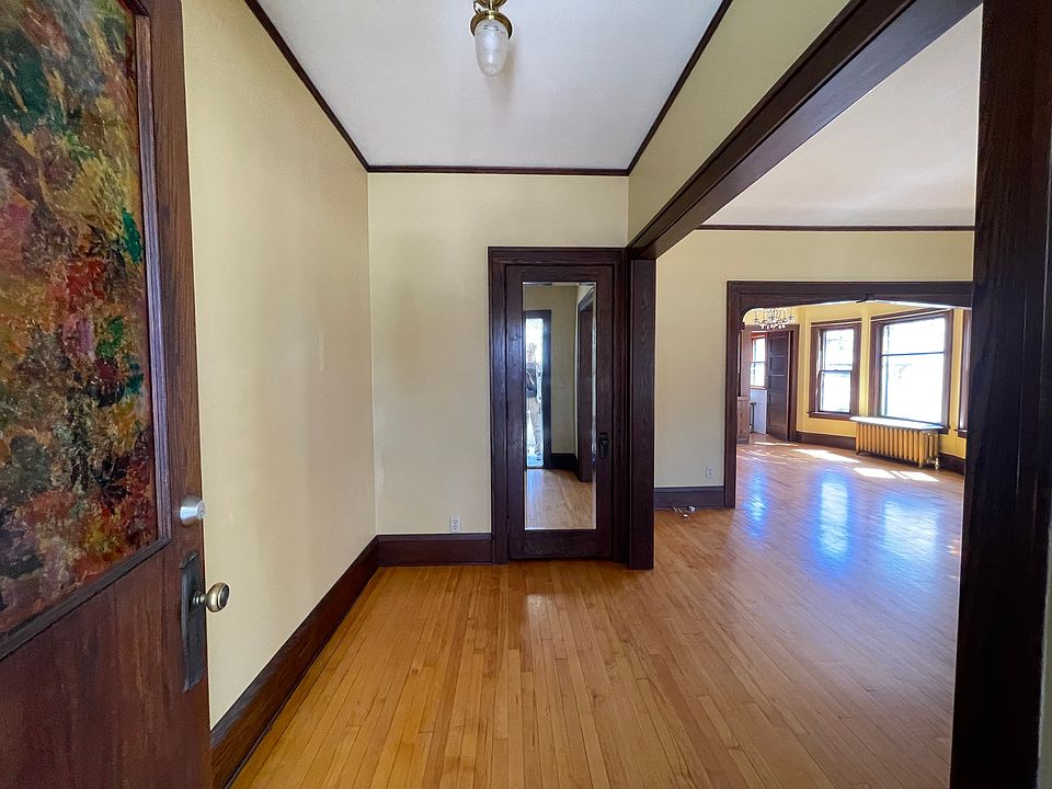 Foyer looking at entry closet, dining room in background