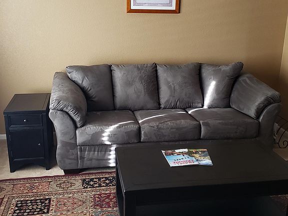 Living Room with included couch and tables