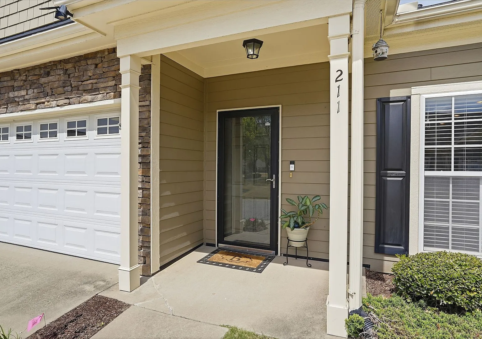 Experience refined, low-maintenance living in this beautifully appointed end-unit townhome — Photo 4