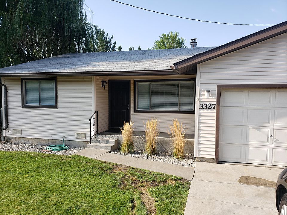 1st image of 3327 E 57th Ave