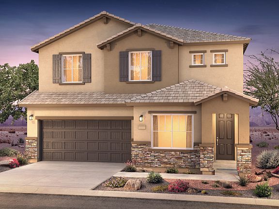 Exterior view of the Park Place, a two story home with a 2-car garage and beautiful stone.