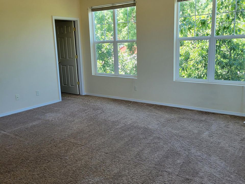 Master bedroom windows facing north, entry door to master bath