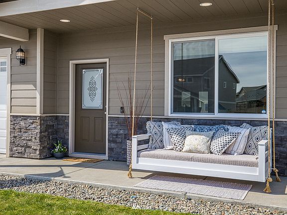Attractive entry with concrete patio welcomes you to 2305 Middlecrest Drive.