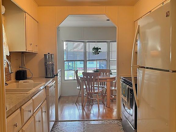 Galley kitchen lots of light