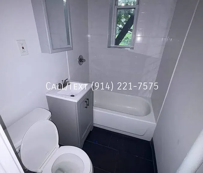 165 E 3rd St #2E — Photo 9
