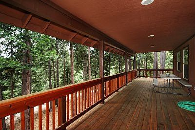 Covered back deck the length of the home to enjoy the sierra views