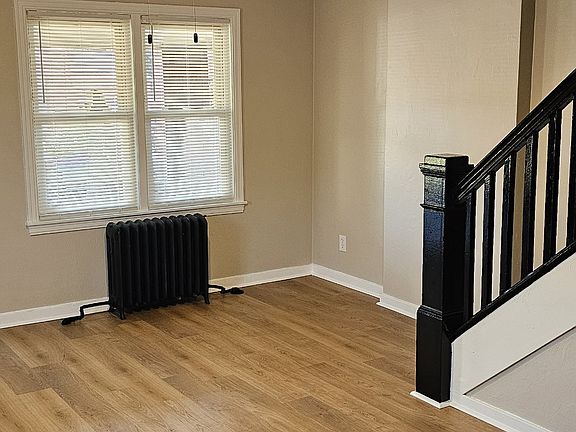 Living room with new paint and New vinyl flooring
