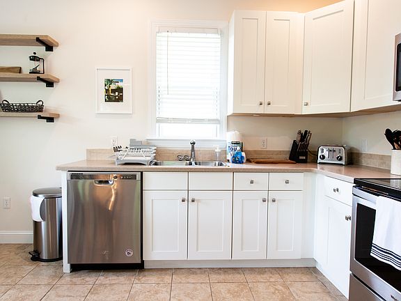 Fully kitchen with beautiful appliances and abundant natural light.