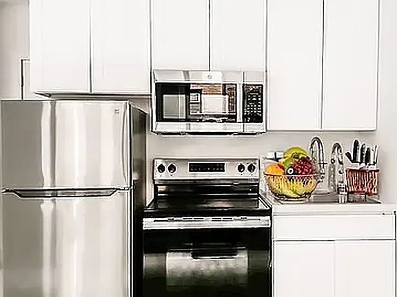 3rd image of 248 W 35th St #703